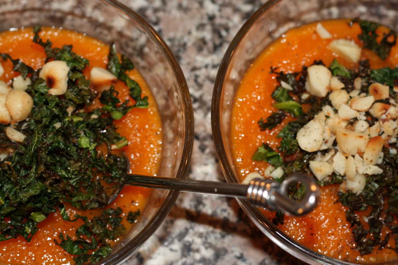 Carrot Ginger Soup with Kale Shreds and Toasted Macadamias